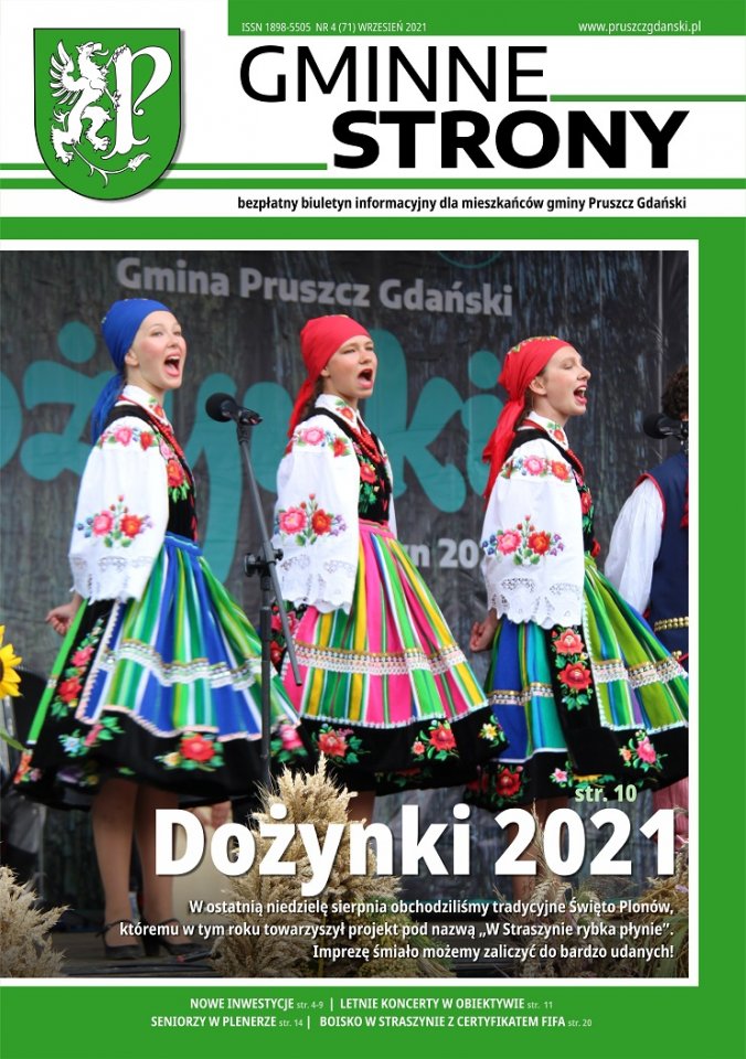 Strona tytułowa gazety Gminne strony - Główne zdjęcie - Dziewczęta w strojach ludowych tańczą na scenie podczas dożynek 